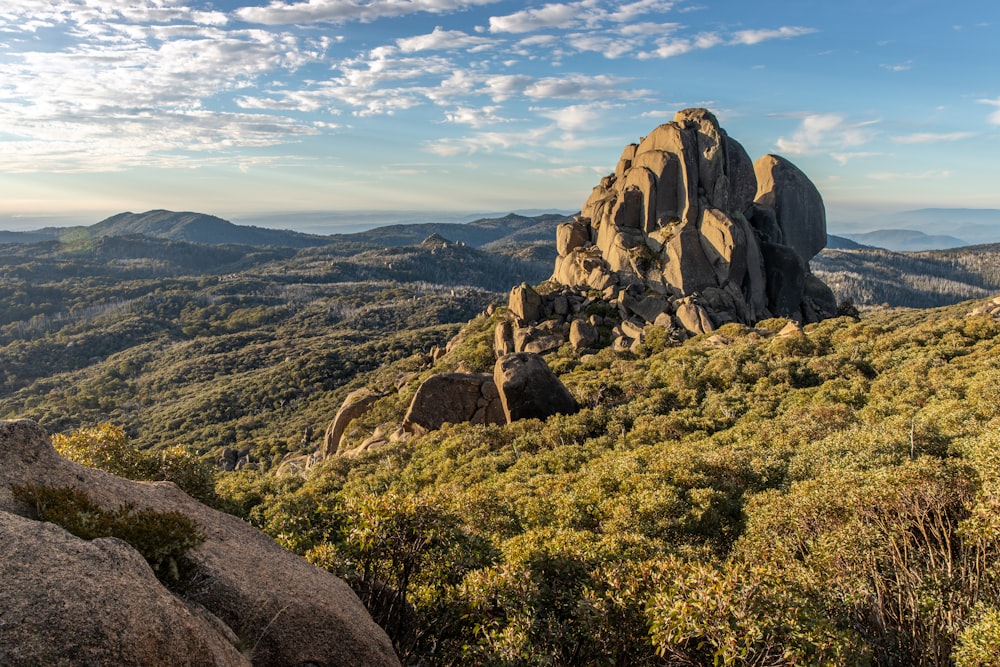 green and brown mountain under blue sky during daytime