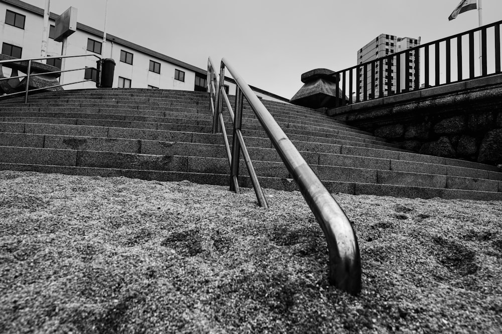 grayscale photo of metal railings