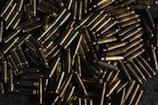 brown wooden sticks on black surface
