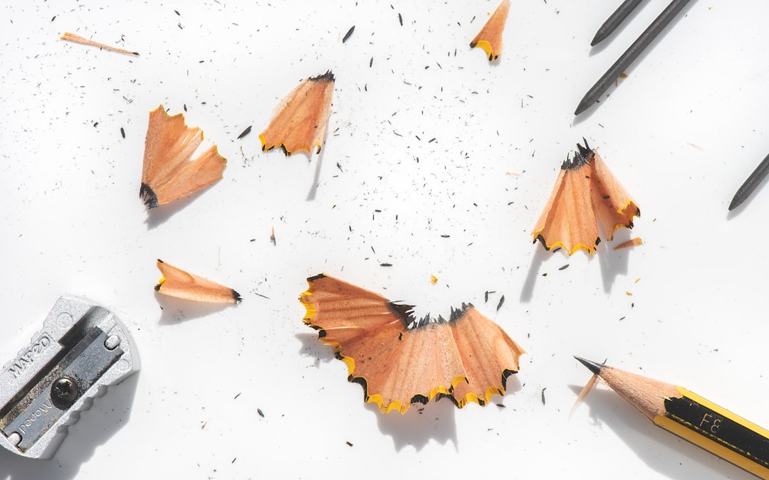 yellow coloring pencils on white surface