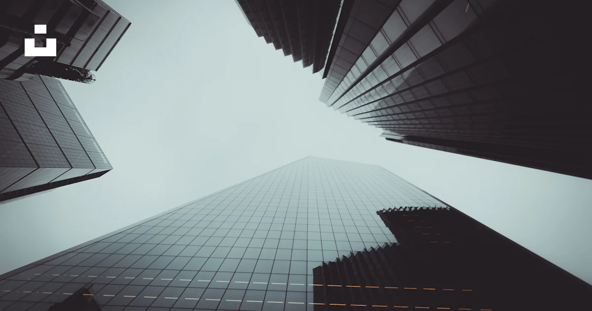 Low angle photography of high rise building photo – Free Grey Image on ...