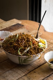 green vegetable on white ceramic bowl