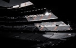 black and white stadium during night time