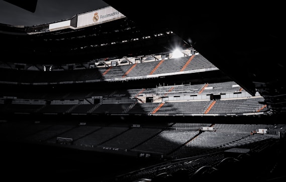black and white stadium during night time