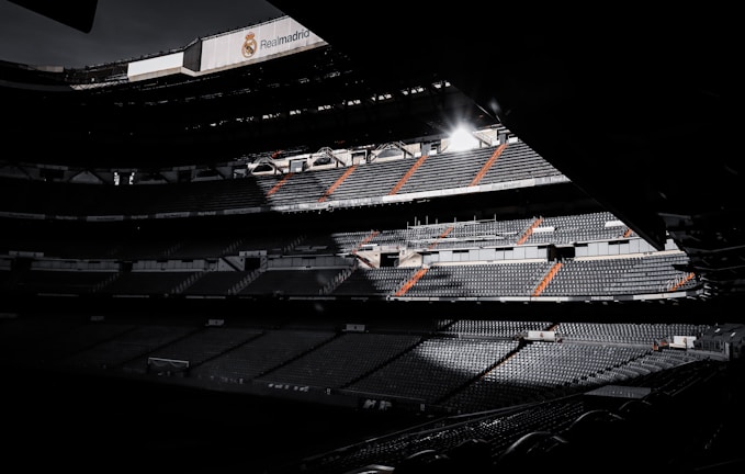 black and white stadium during night time
