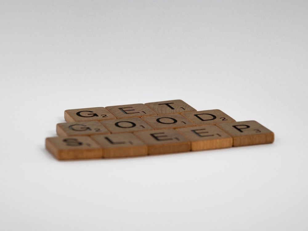 brown wooden letter t-letter blocks