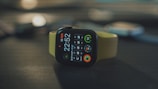 white sports band apple watch