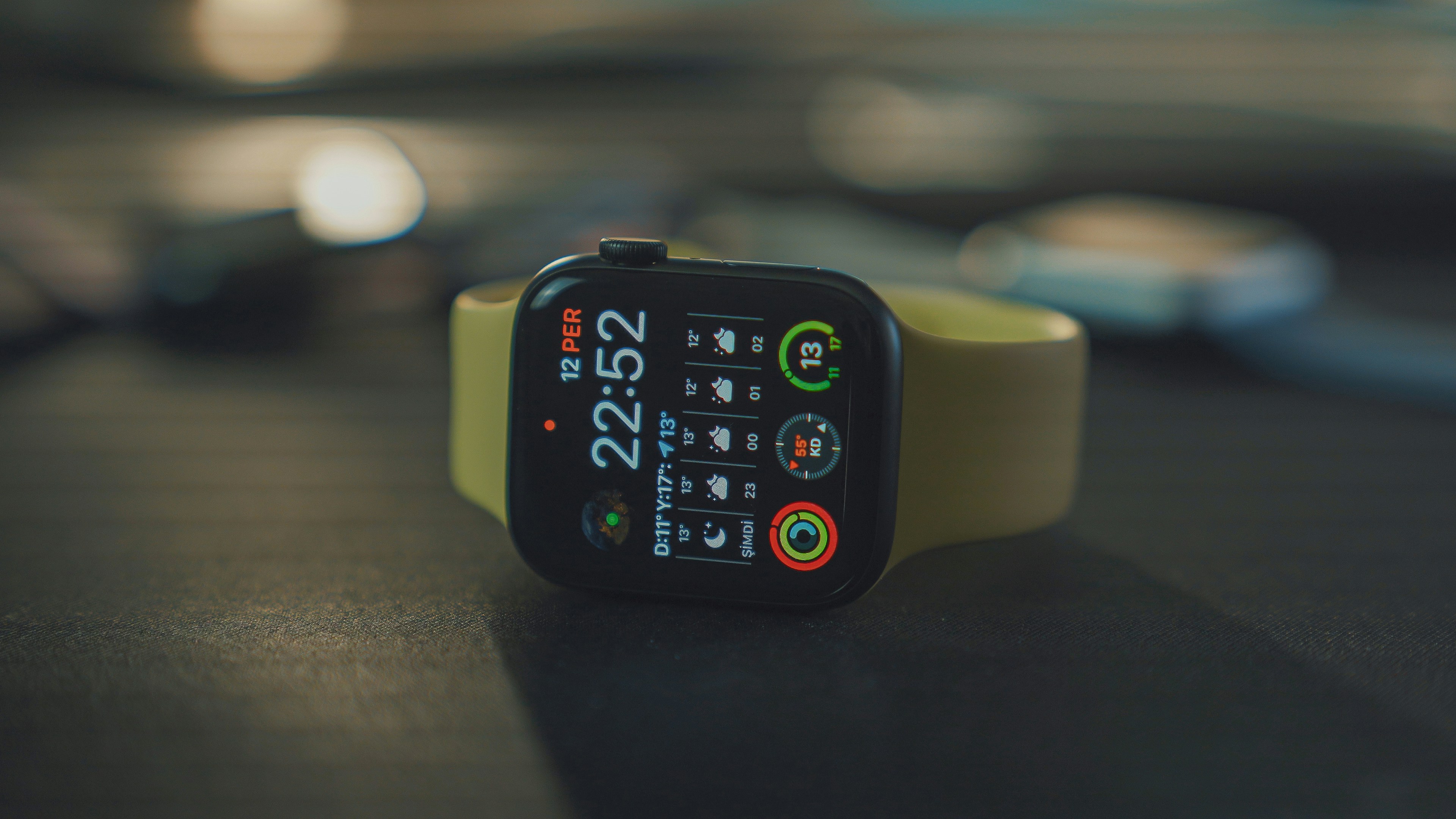Smartwatch on wrist showing heart rate display close up