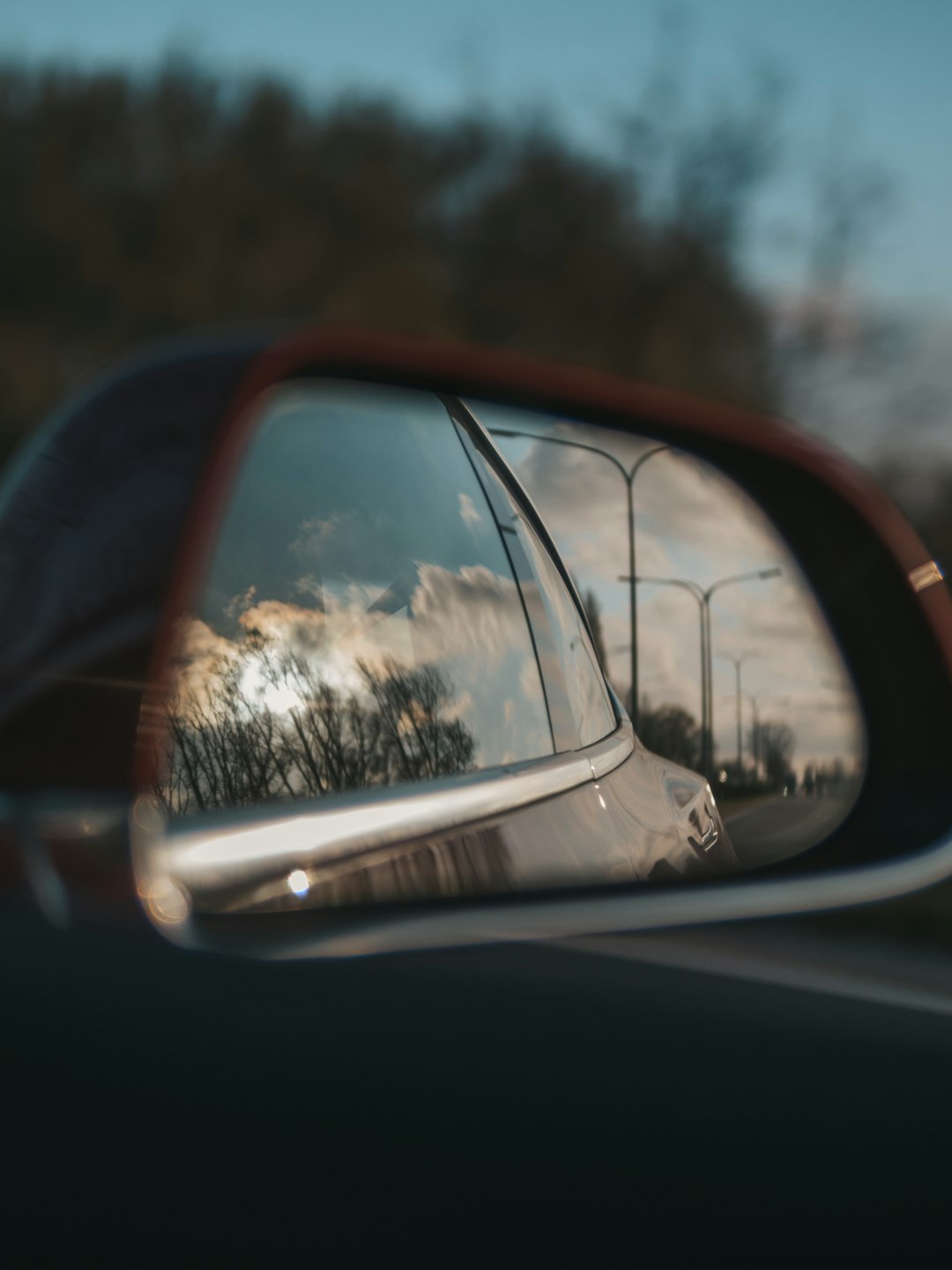 car side mirror showing car side mirror