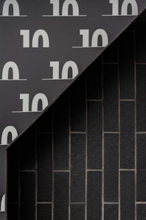 An image featuring Pegamax's white and gray tile adhesives.