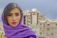 woman in purple hijab taking selfie
