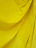 A vibrant cotton fabric dyed in a rich, bright yellow showcasing Mudra Industries’ direct yellow 5gll.
