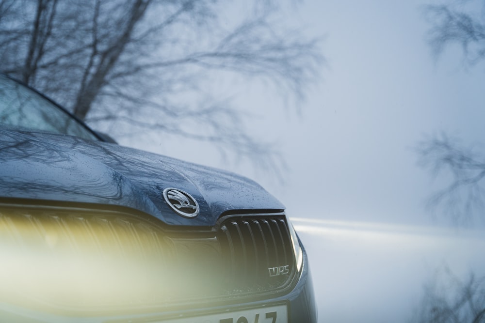 blue car with snow on top