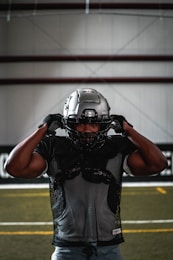 football player in black helmet