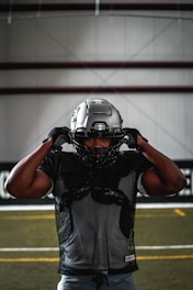 football player in black helmet