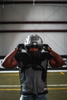 football player in black helmet