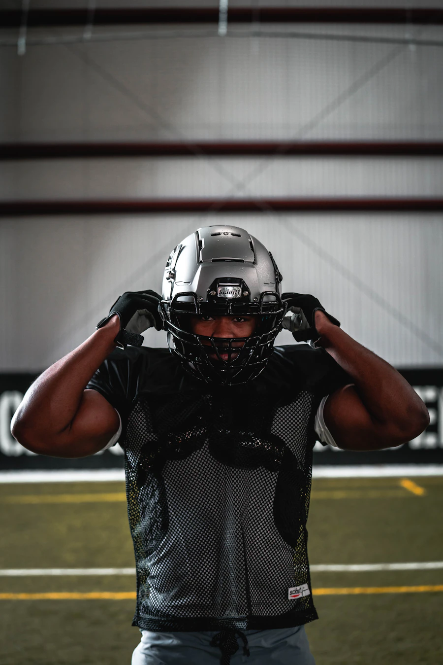 Football player in a black helmet