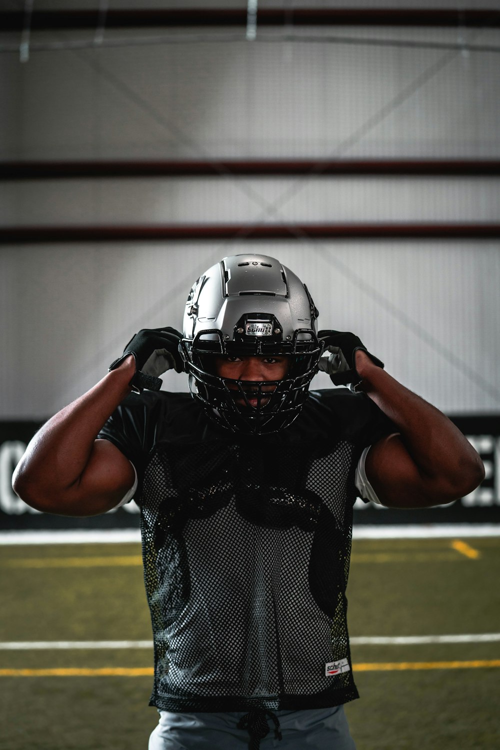 football player in black helmet
