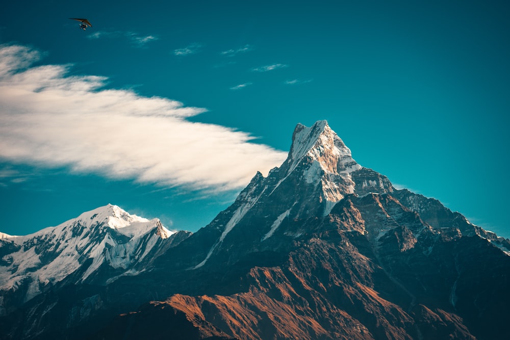 snow covered mountain under blue sky during daytime