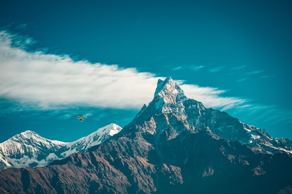 snow covered mountain under blue sky during daytime