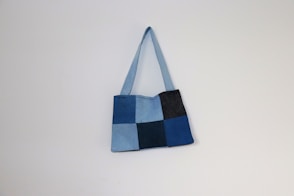 black blue and brown tote bag