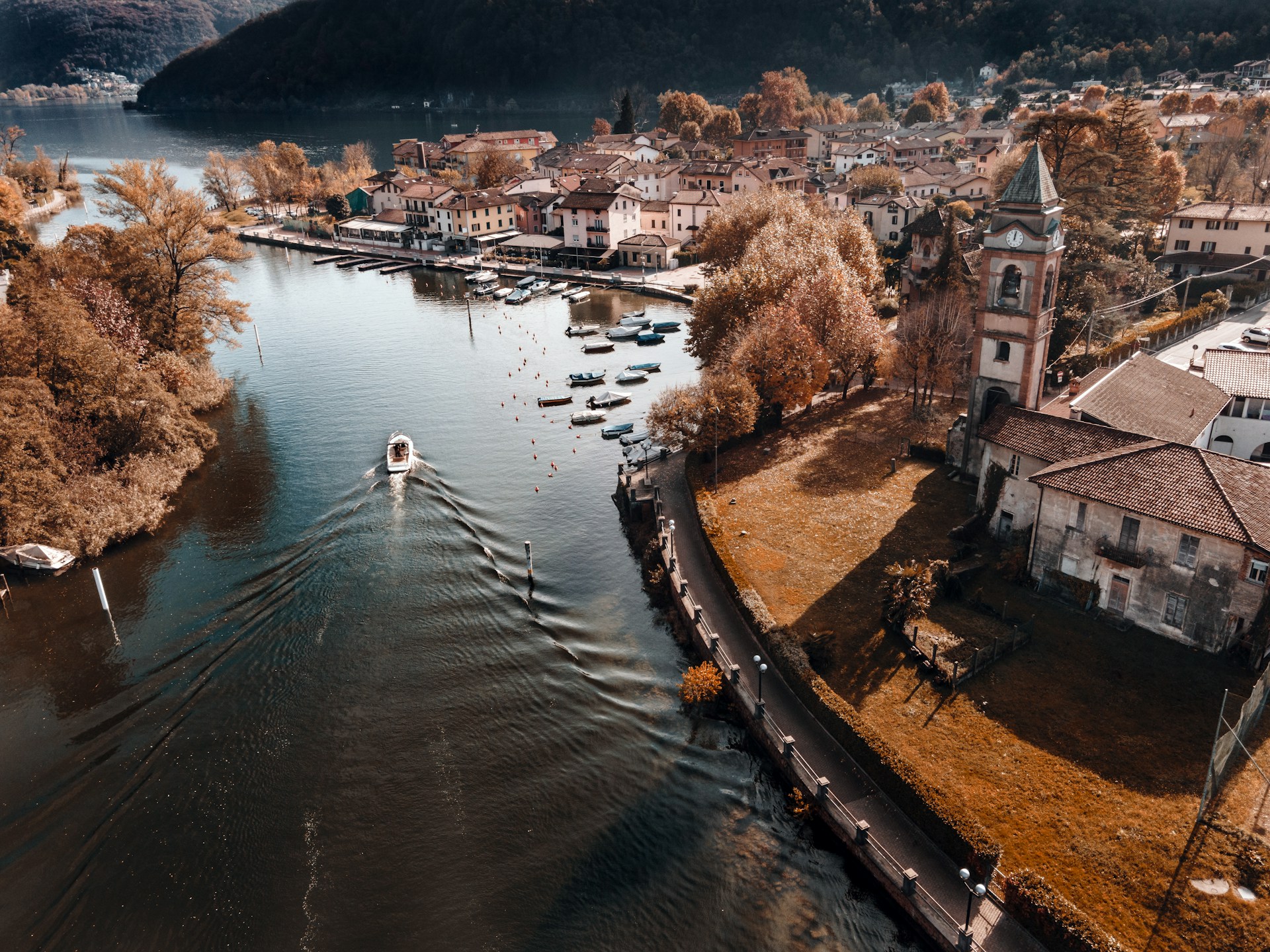 aerial view of river between city buildings during daytime