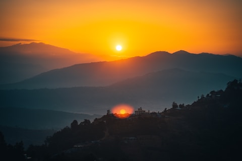 silhouette of mountain during sunset