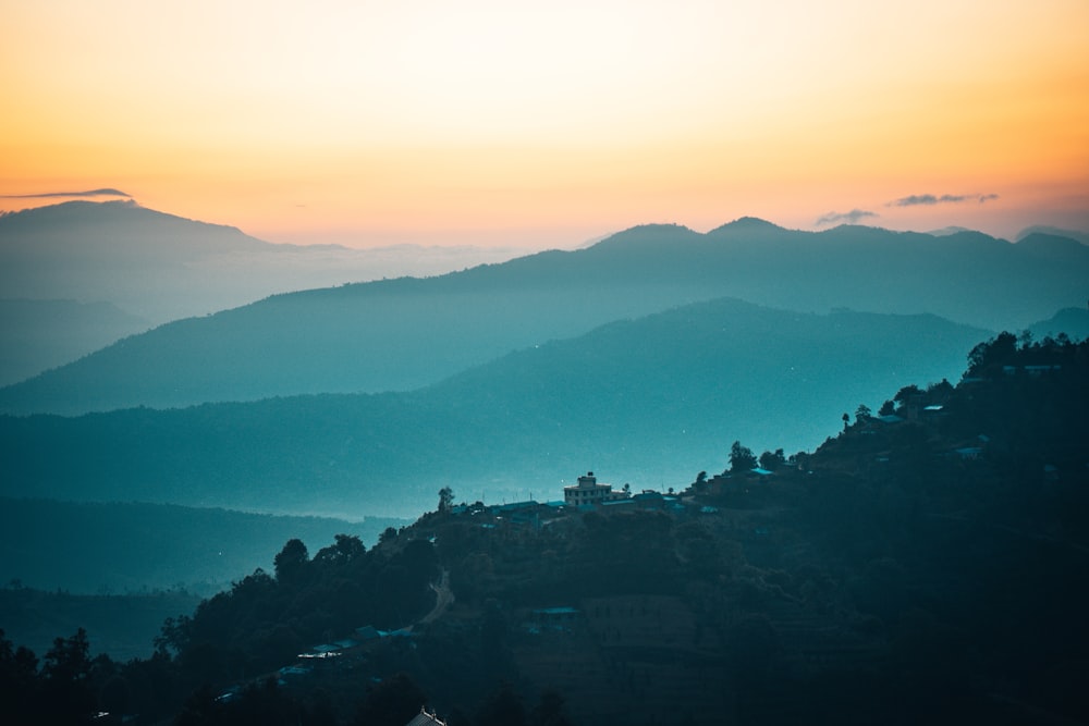 silhouette of mountain during sunset