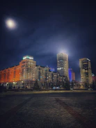 A moody nighttime cityscape filmed with cinematic lighting, emphasizing contrast and depth.