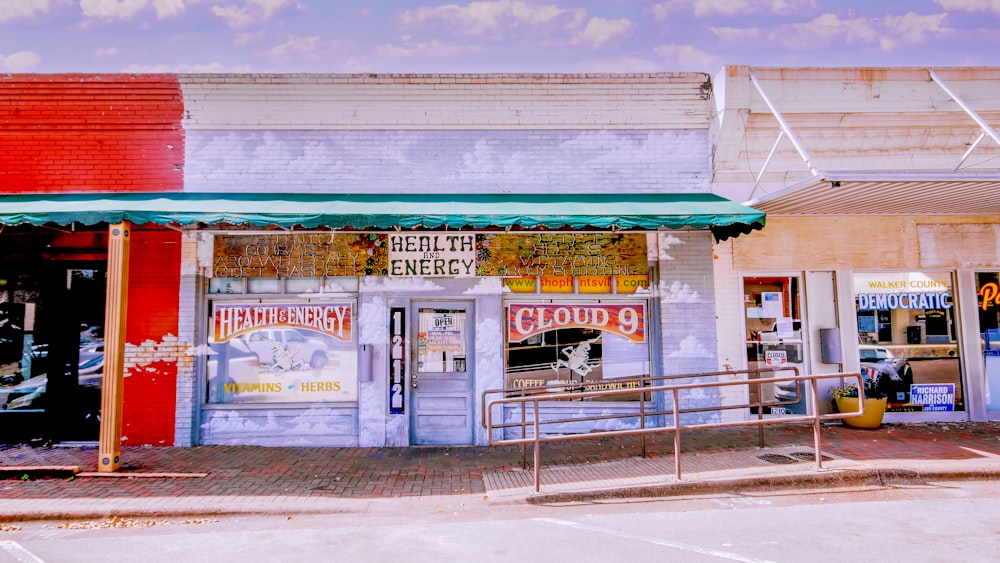 white and green store front during daytime