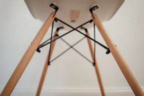 Close-up of the reinforced frame of a campease chair showing sturdy metal joints.