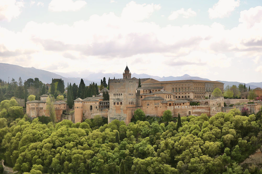 The Alhambra on its hill above the trees