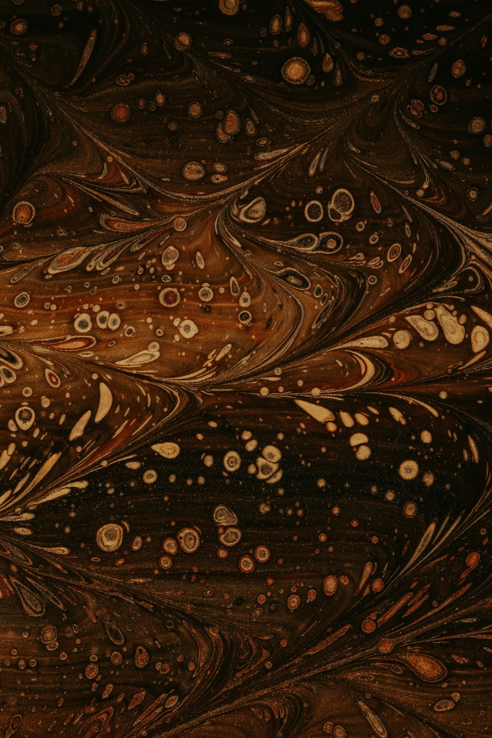 brown and black floral textile