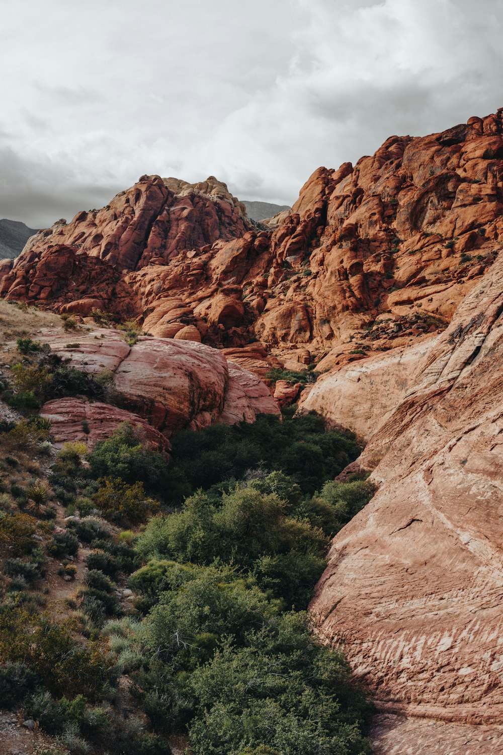 brown rocky mountain under white cloudy sky during daytime