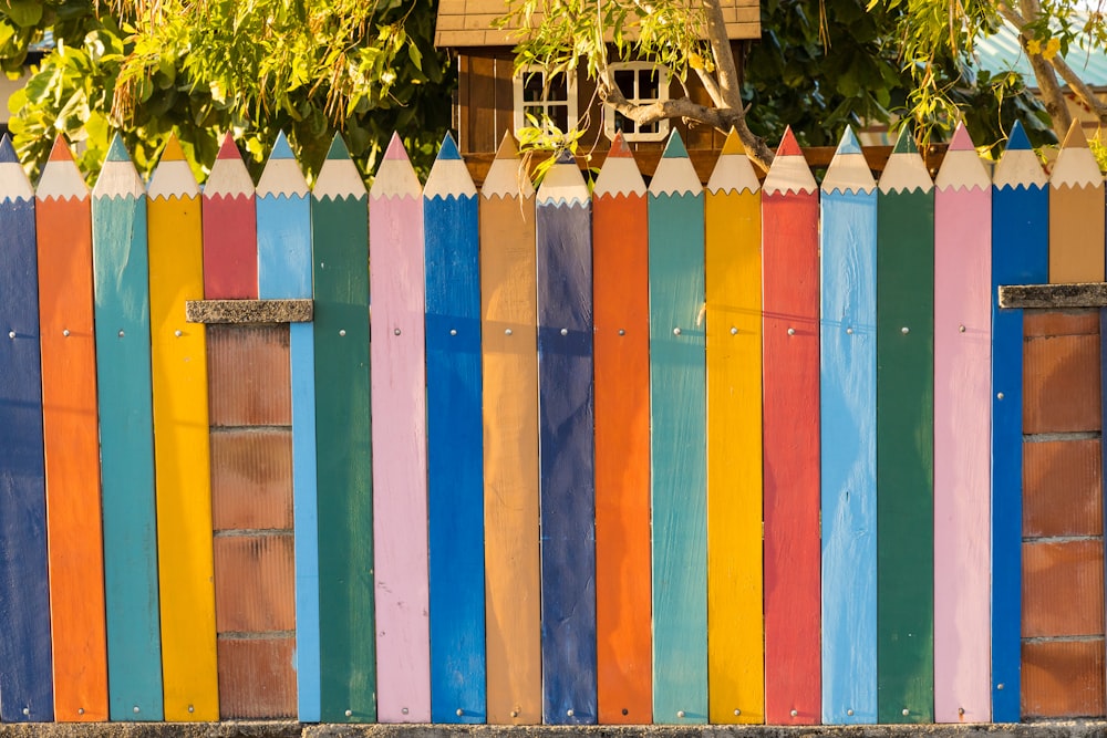 white blue and red wooden fence