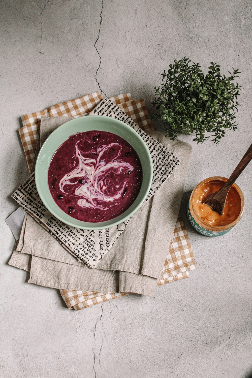 red soup in white ceramic bowl