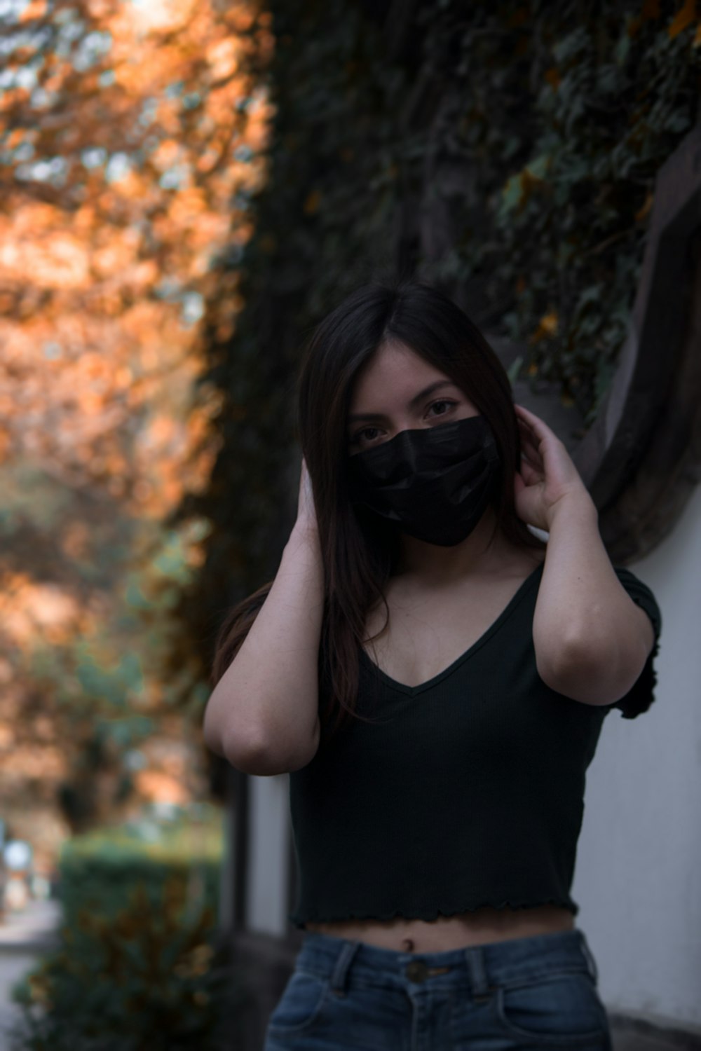 woman in black tank top wearing black sunglasses