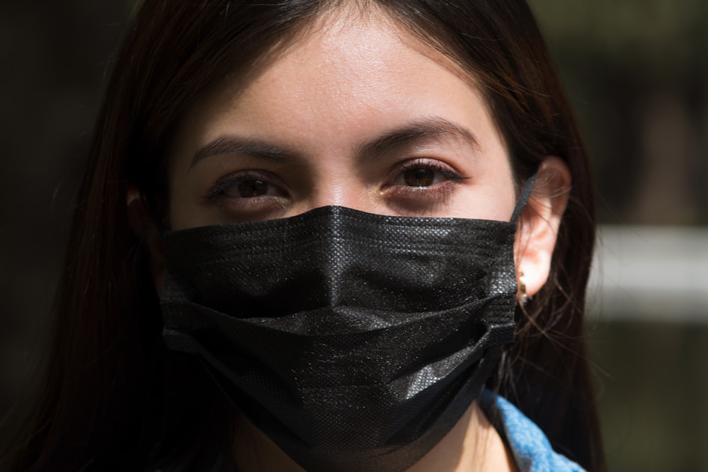 woman with black face mask