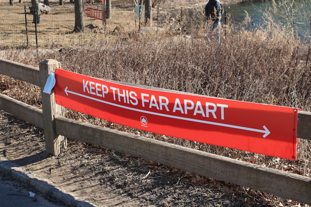 red and white wooden signage