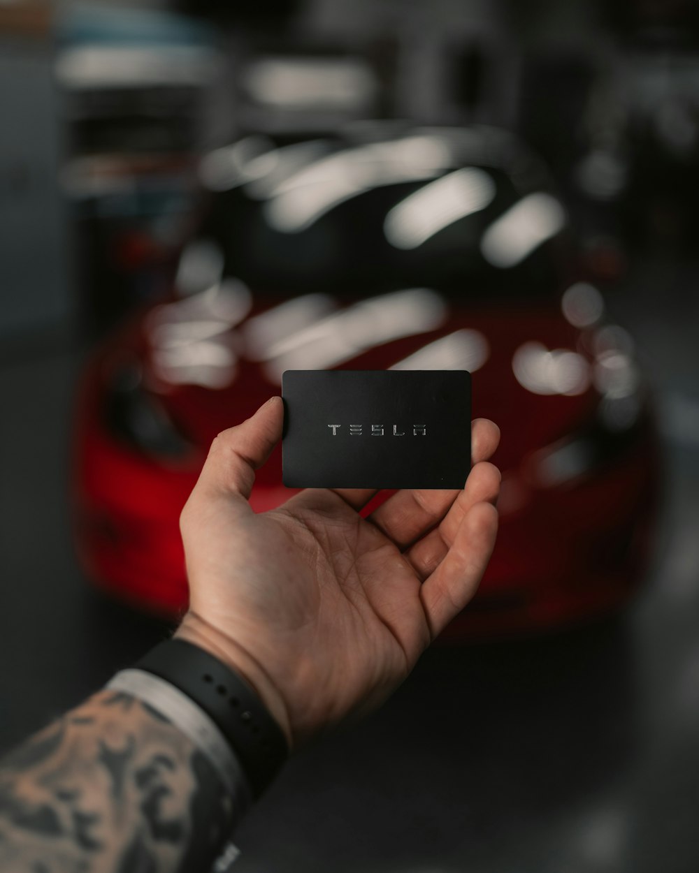 person holding black power bank