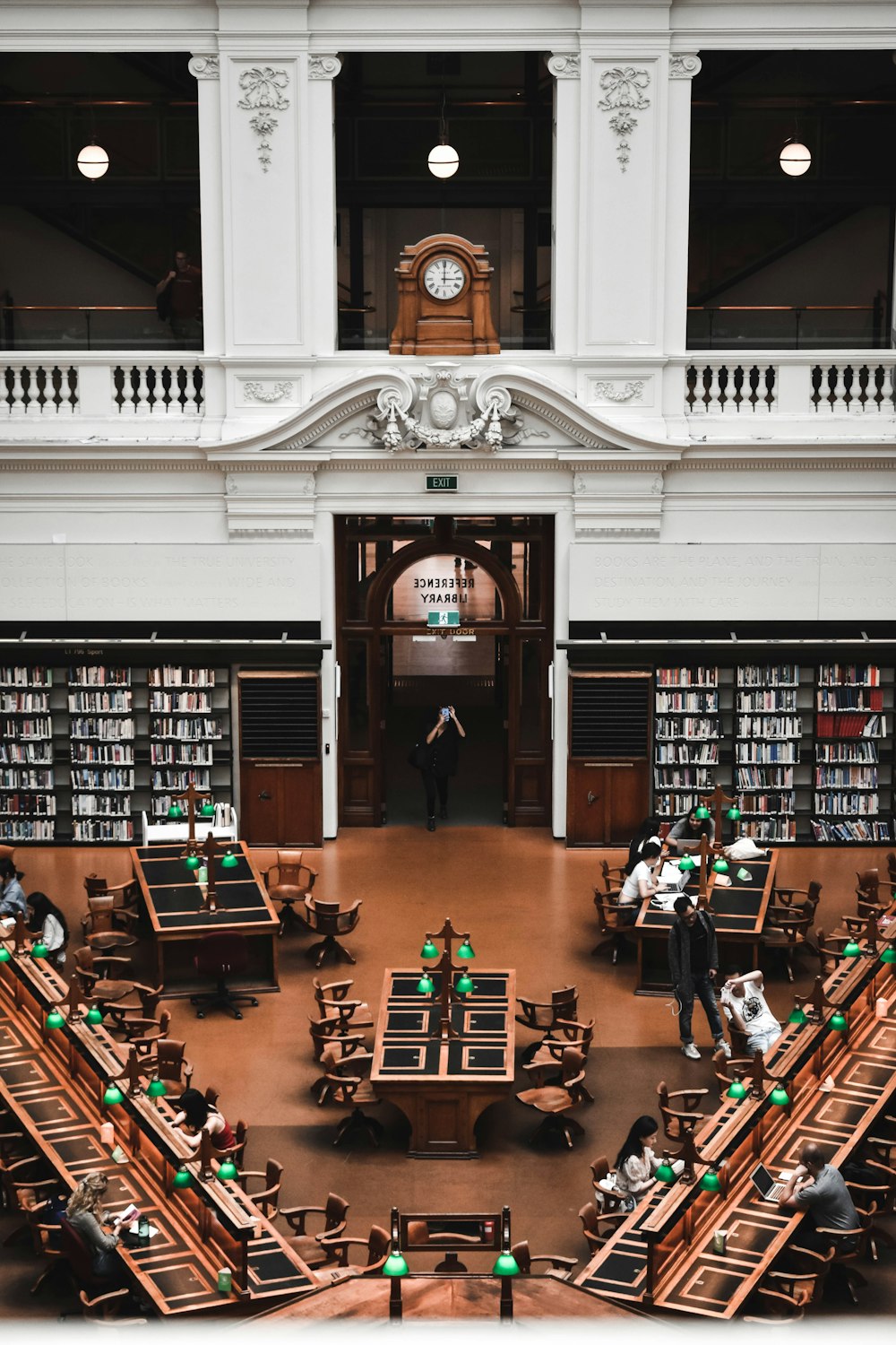 people sitting on chairs inside building