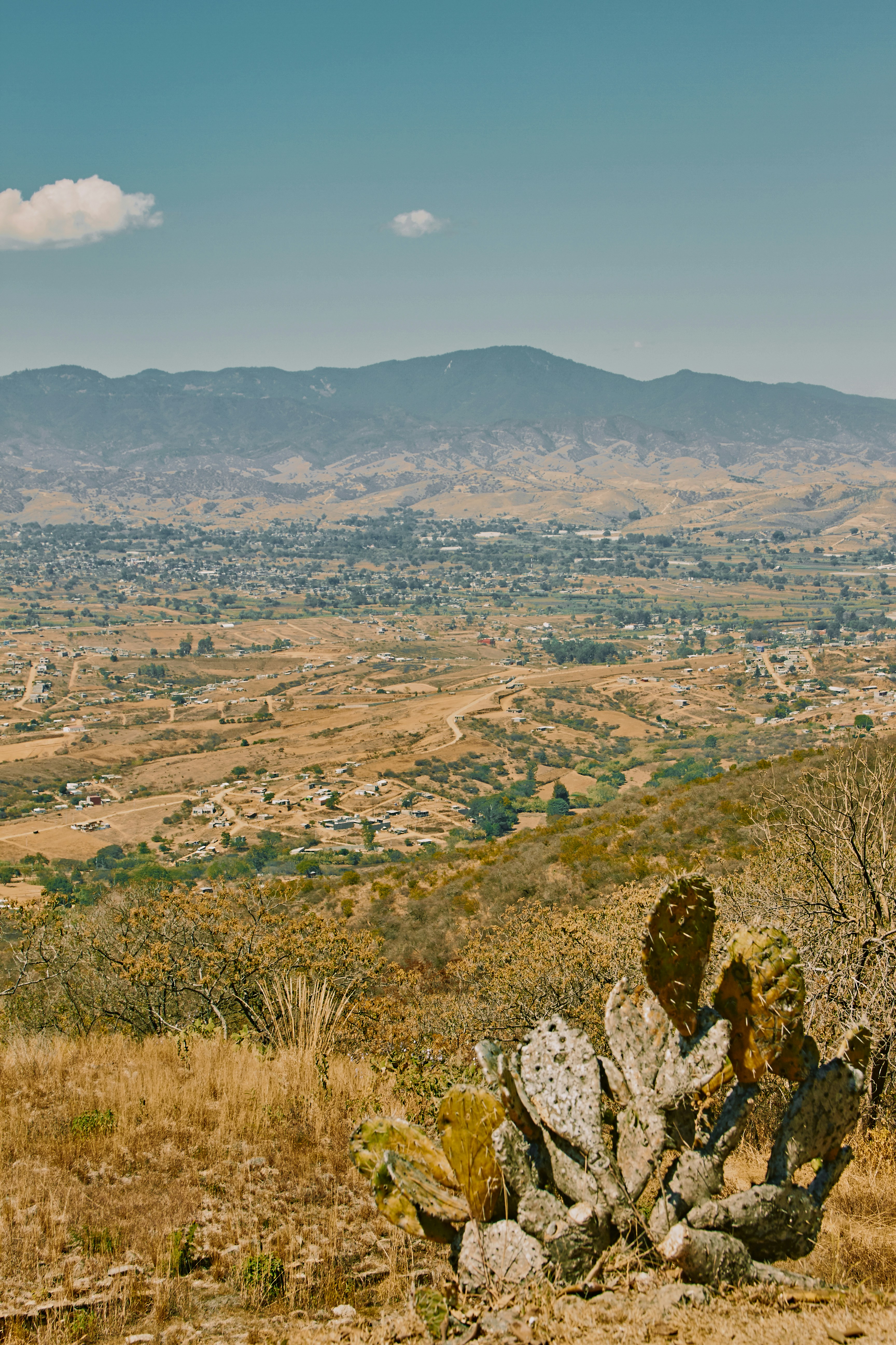 aerial view of green and brown mountains during daytime