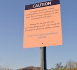 a caution sign in the middle of a desert