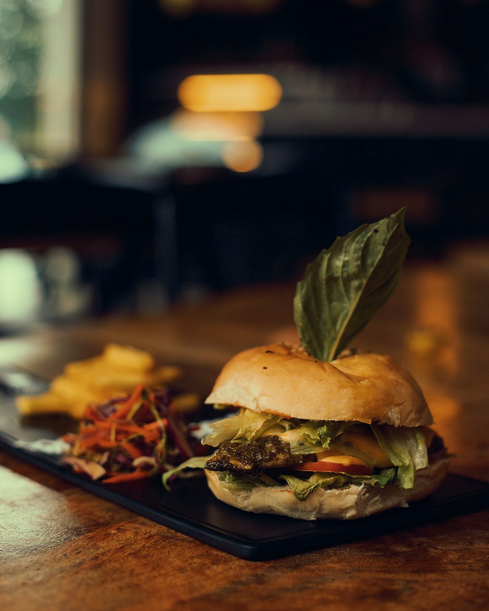 burger on brown wooden tray