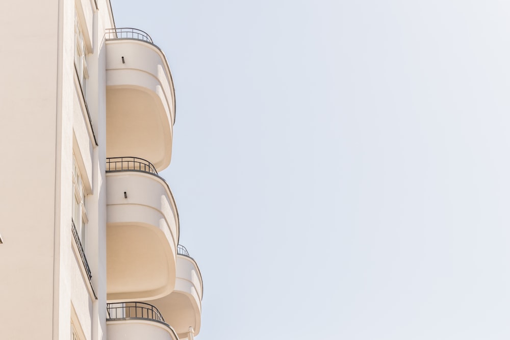 white concrete building under white sky during daytime