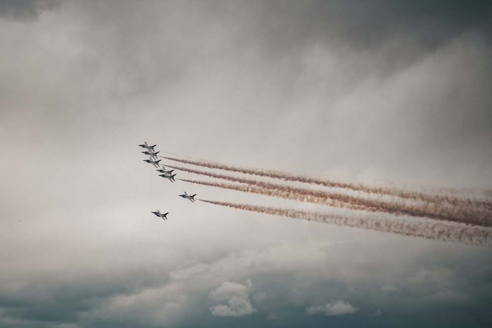 four fighter planes in mid air