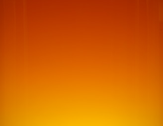 Close-up of a gradient button with smooth animation in orange and light blue hues.