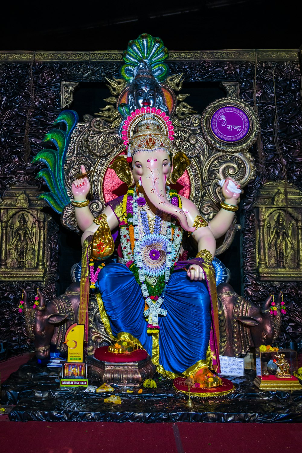 hindu deity statue in front of hindu deity statue