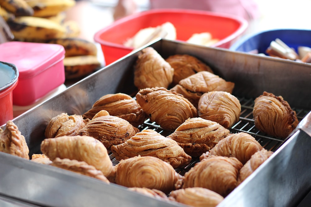 brown and white nuts on stainless steel tray