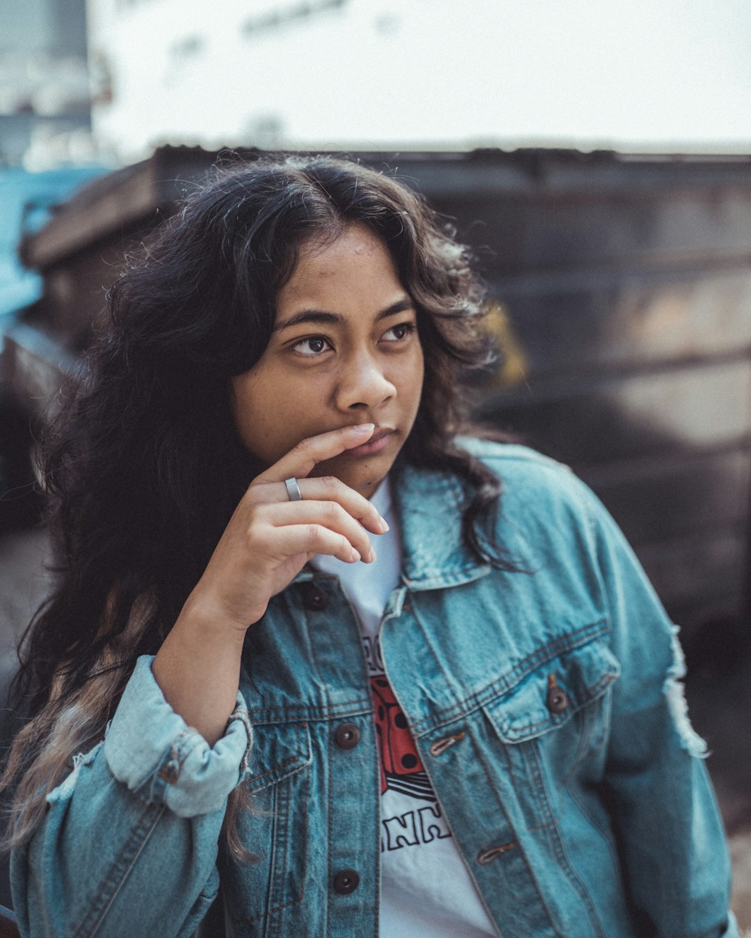 woman in blue denim jacket